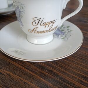 Elegant White Anniversary Tea Cup and Saucer Set